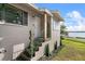 Front exterior with steps leading to entrance and view of nearby water at 507 Orange Ave, Ocoee, FL 34761