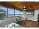 Sunroom with calming water views, wood ceiling, and a bar area at 507 Orange Ave, Ocoee, FL 34761