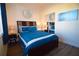 Bright bedroom featuring a comfortable bed and modern decor at 7503 Mourning Dove Cir # 104, Kissimmee, FL 34747
