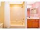 Clean bathroom with tub shower and updated vanity at 11313 Via Andiamo, Windermere, FL 34786