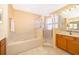 Bathroom with a large soaking tub and shower at 11313 Via Andiamo, Windermere, FL 34786