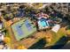 Aerial view of community pool, tennis courts and clubhouse at 11313 Via Andiamo, Windermere, FL 34786