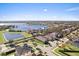 Aerial view of community near a lake at 11640 Hampstead St, Windermere, FL 34786