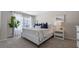 Bedroom with a queen bed, window, and nightstand at 1210 Balsam Dr, Davenport, FL 33837