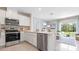 Modern kitchen with stainless steel appliances and island at 1210 Balsam Dr, Davenport, FL 33837