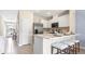 Modern kitchen with stainless steel appliances and an island at 1210 Balsam Dr, Davenport, FL 33837
