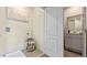 Laundry room with sink and built-in shelving at 1210 Balsam Dr, Davenport, FL 33837