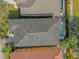 Home with dark roof and pool in upscale neighborhood at 1239 Radiant St, Reunion, FL 34747