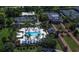 Community pool, tennis courts, and playground at 1239 Radiant St, Reunion, FL 34747