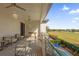 Relaxing balcony overlooking a golf course and houses at 1239 Radiant St, Reunion, FL 34747