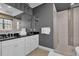 Main bathroom with double vanity and large walk-in shower at 1239 Radiant St, Reunion, FL 34747