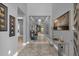 Bright hallway with contemporary decor and tile floors at 1239 Radiant St, Reunion, FL 34747