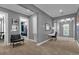 Upstairs hallway with carpet, art, and seating at 1239 Radiant St, Reunion, FL 34747