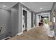 Upper level hallway with laundry area and game room access at 1239 Radiant St, Reunion, FL 34747