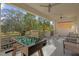 Relaxing outdoor patio with foosball table and views of the golf course at 1239 Radiant St, Reunion, FL 34747