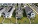 Three houses with solar panels on the roof, located in a residential area at 1455 Williams Rd, Winter Garden, FL 34787