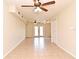 Bright living room with tile floors and sliding glass doors at 2230 E Triangle Dr, Longwood, FL 32779