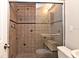 Large tiled shower with built-in seat at 2230 E Triangle Dr, Longwood, FL 32779