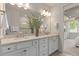 Double vanity bathroom with granite countertop at 2326 Daisy Tree Rd, Saint Cloud, FL 34771