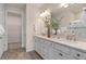 Double vanity bathroom with walk-in shower at 2326 Daisy Tree Rd, St Cloud, FL 34771