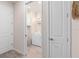 Bright laundry room with washer, dryer, and cabinets at 2326 Daisy Tree Rd, St Cloud, FL 34771