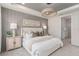 Serene main bedroom with large bed and access to bathroom at 2326 Daisy Tree Rd, St Cloud, FL 34771