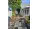 Backyard with a patio, landscaping, and gate at 3563 S Saint Lucie Dr, Casselberry, FL 32707