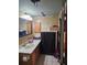 Bathroom with sink, mirror and linen cabinet at 3563 S Saint Lucie Dr, Casselberry, FL 32707