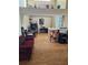 Bright dining area with hardwood floors and a workspace at 3563 S Saint Lucie Dr, Casselberry, FL 32707