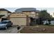 Charming two-story home with attached garage, landscaped yard, and white picket fence at 3563 S Saint Lucie Dr, Casselberry, FL 32707