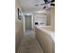 Upper level hallway with laundry closet and carpet at 3563 S Saint Lucie Dr, Casselberry, FL 32707