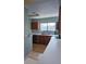 Clean kitchen with stainless steel appliances and wood cabinets at 3563 S Saint Lucie Dr, Casselberry, FL 32707