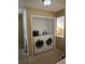 Convenient laundry closet with washer and dryer at 3563 S Saint Lucie Dr, Casselberry, FL 32707