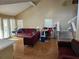 Relaxing living room with hardwood floors and multiple seating areas at 3563 S Saint Lucie Dr, Casselberry, FL 32707