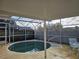 Screened-in pool area with patio furniture at 3563 S Saint Lucie Dr, Casselberry, FL 32707