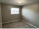 Bedroom with tile floors and a double door closet at 4617 Frisco Cir, Orlando, FL 32808