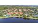 Aerial view of community amenities and lake at 12096 Talitha Ln, Orlando, FL 32827