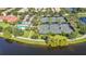 Four tennis courts and pool area at 12096 Talitha Ln, Orlando, FL 32827