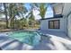 Inviting kidney-shaped pool with ample patio space at 1315 Wheeler Rd, Apopka, FL 32703