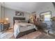 Elegant bedroom with a gray bed and modern dresser at 151 E Washington St # 201, Orlando, FL 32801