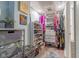 Large walk-in closet with shelving and drawers at 151 E Washington St # 201, Orlando, FL 32801