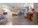 Open concept living area with hardwood floors and gallery wall at 151 E Washington St # 201, Orlando, FL 32801