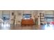 Spacious living area with hardwood floors and large windows at 151 E Washington St # 201, Orlando, FL 32801