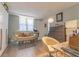 Home office featuring a comfortable sofa and ample storage at 151 E Washington St # 201, Orlando, FL 32801