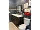 Clean bathroom with dark vanity and modern fixtures at 2521 Avenue A Sw, Winter Haven, FL 33880