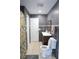 Modern bathroom with gray tile and updated fixtures at 2521 Avenue A Sw, Winter Haven, FL 33880