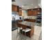 Modern kitchen with granite countertops and stainless steel appliances at 2521 Avenue A Sw, Winter Haven, FL 33880