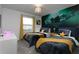 Fun bedroom with a soccer theme and twin beds at 4241 Paragraph Dr, Kissimmee, FL 34746