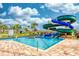 Relaxing pool with waterslide and lounge area at 4241 Paragraph Dr, Kissimmee, FL 34746