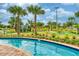 Lazy river winding through a tropical landscape at 4241 Paragraph Dr, Kissimmee, FL 34746
